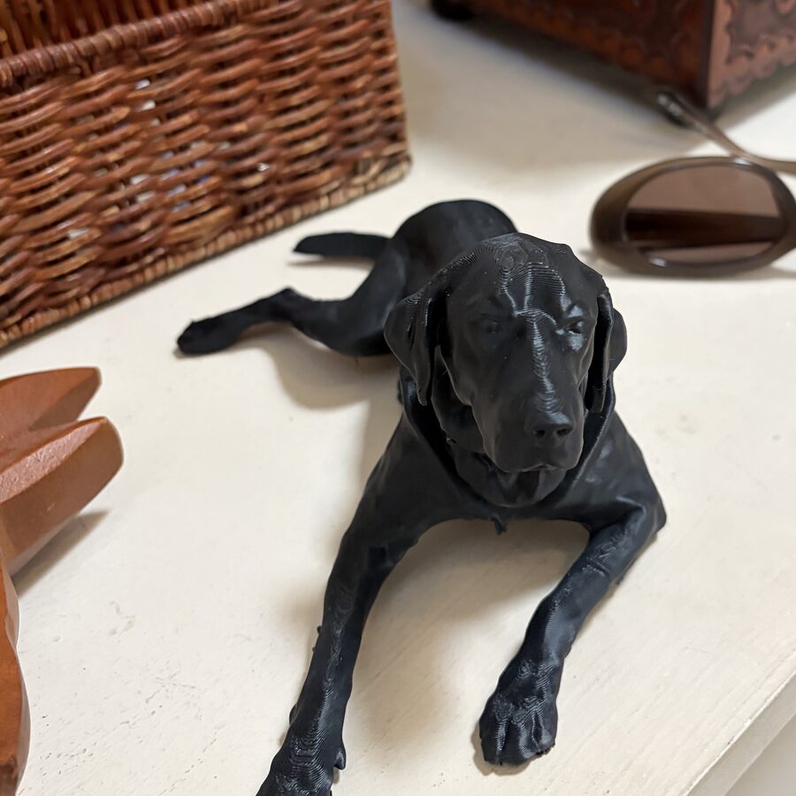 a black Lab as a 3D figurine